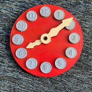 Vintage Red Teach-A-Time Clock Toy